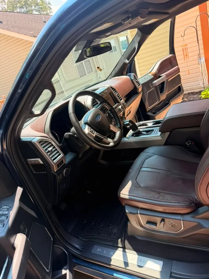 Front leather seats after interior detailing in Chattanooga, TN