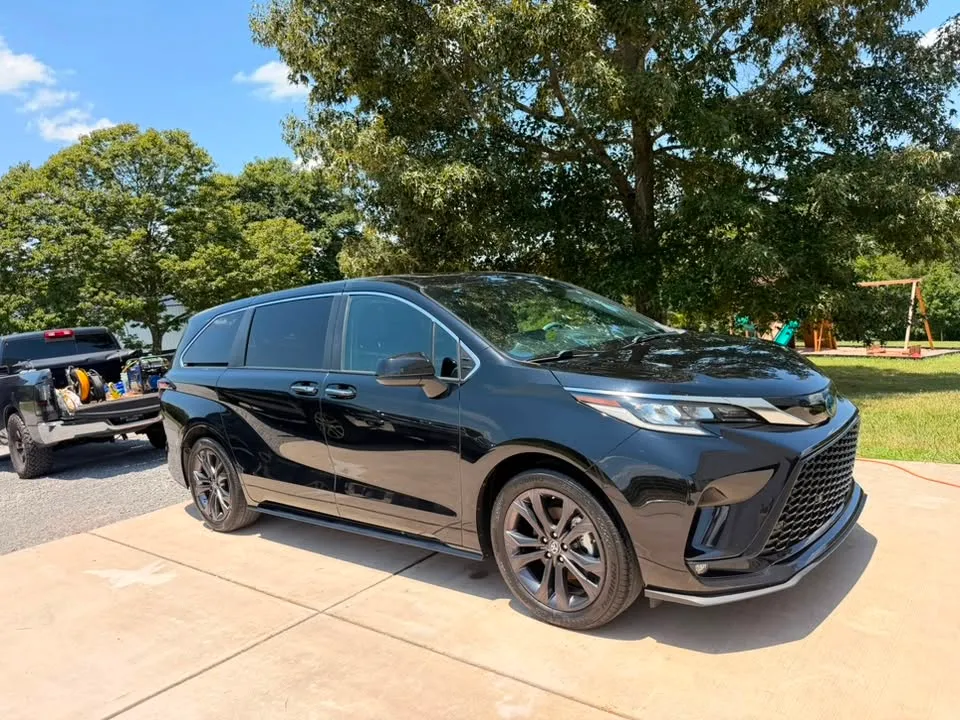 Black Toyota Sienna gleaming after a full detail in Chattanooga, TN