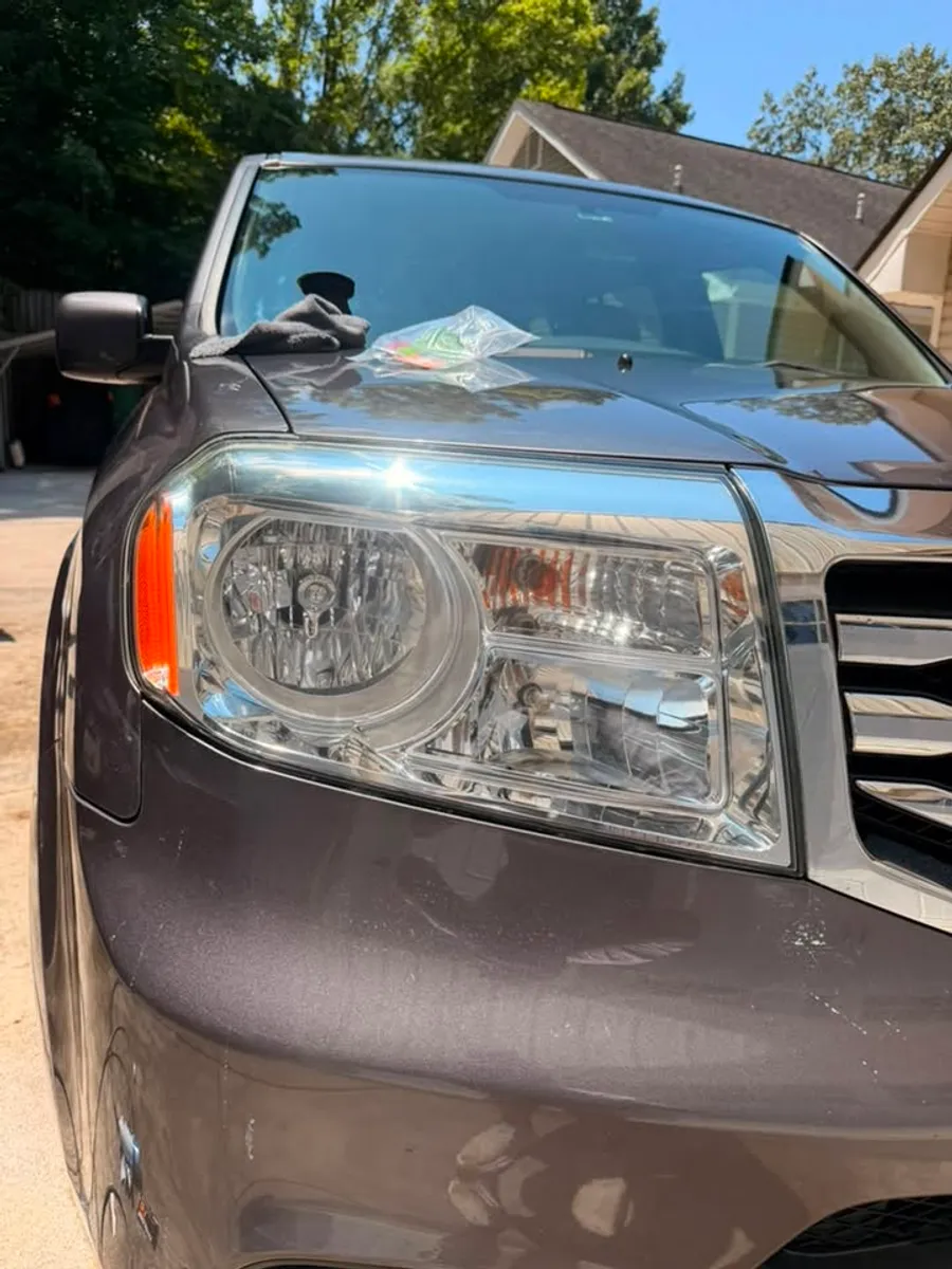 After: Headlight restoration on a Honda Pilot in Chattanooga, TN - passenger side